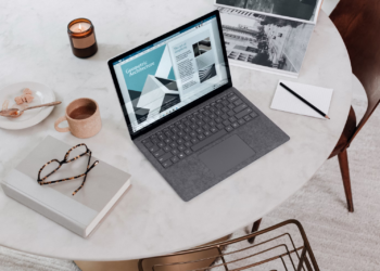 Laptop on a white marble table