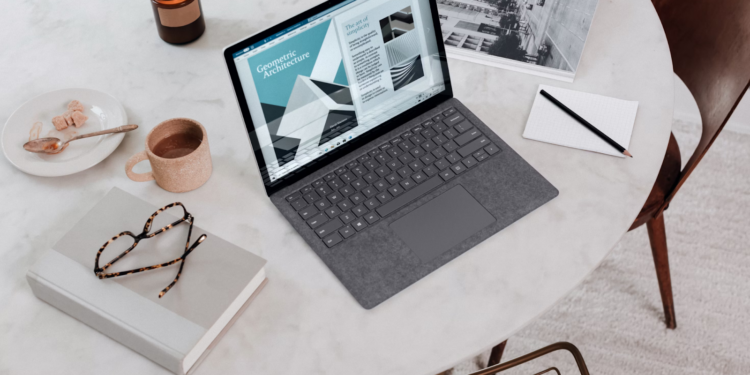 Laptop on a white marble table